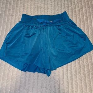 Flowy satin blue track shorts